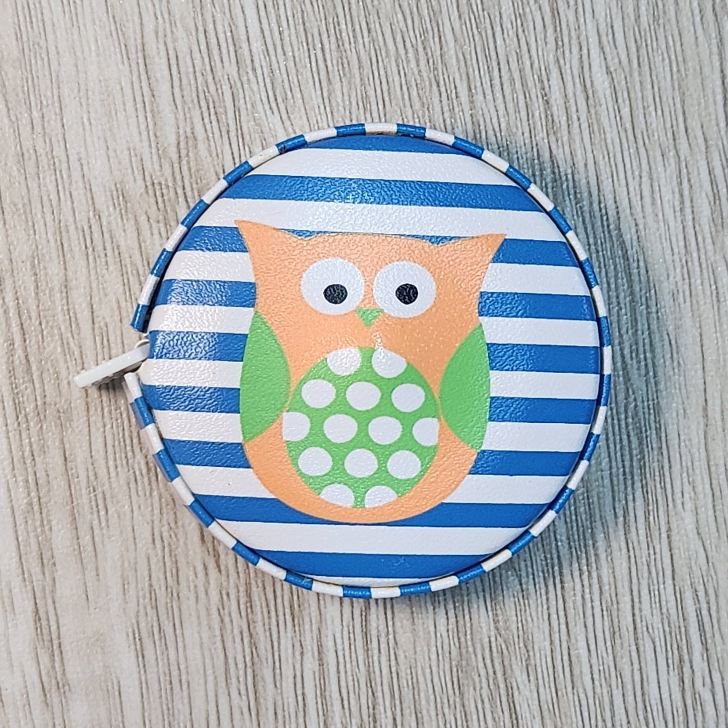 owl measuring tape retractable.