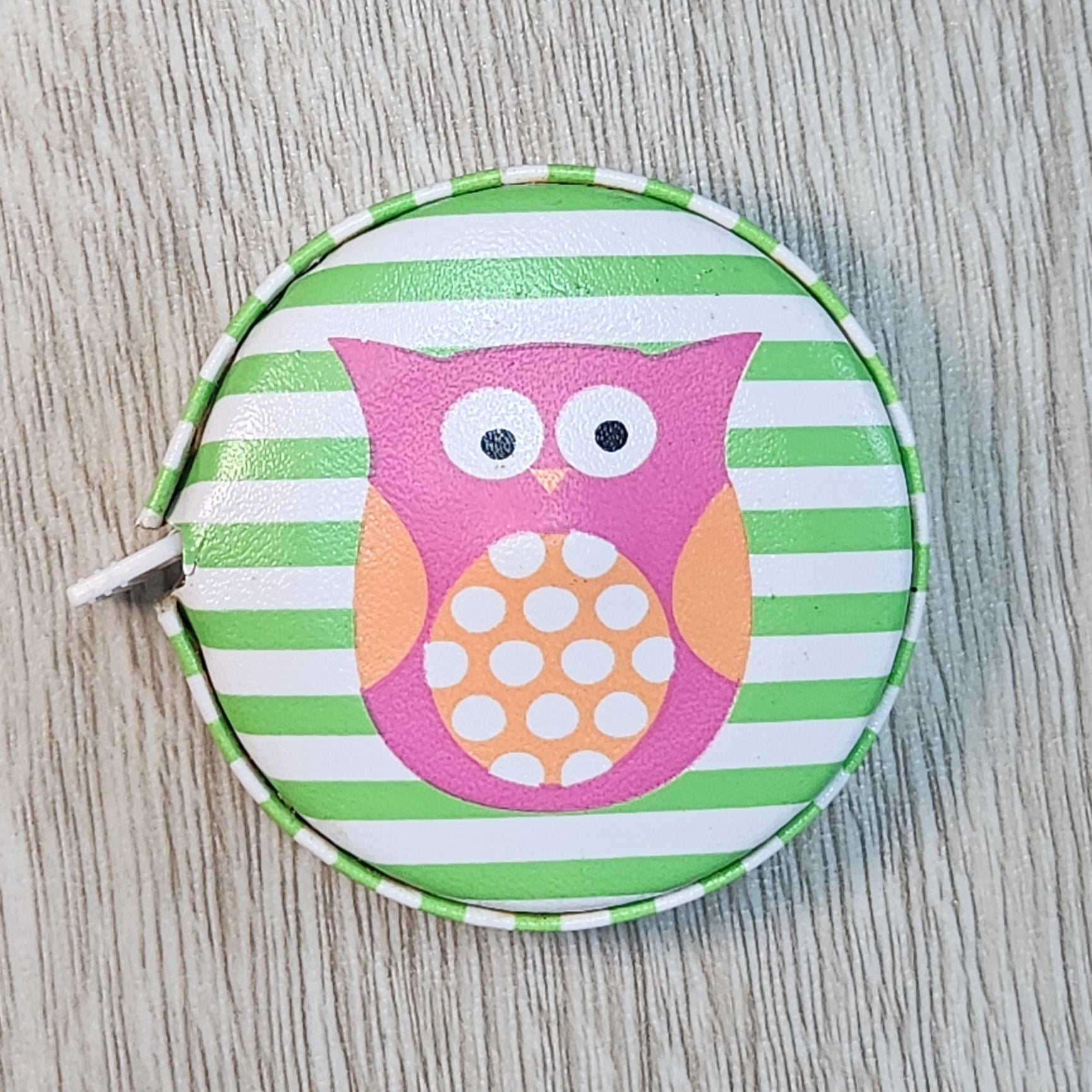 owl measuring tape retractable.