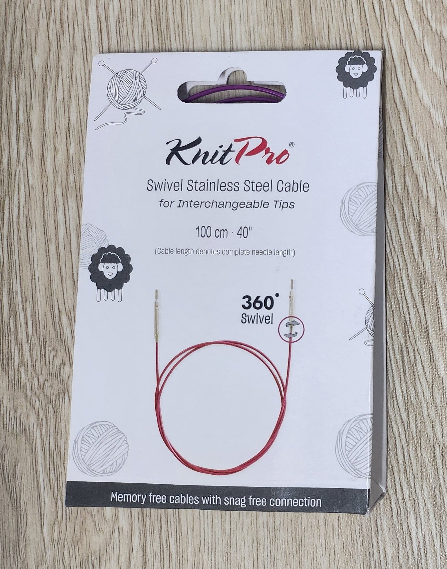 KnitPro cable packaging on a wooden surface