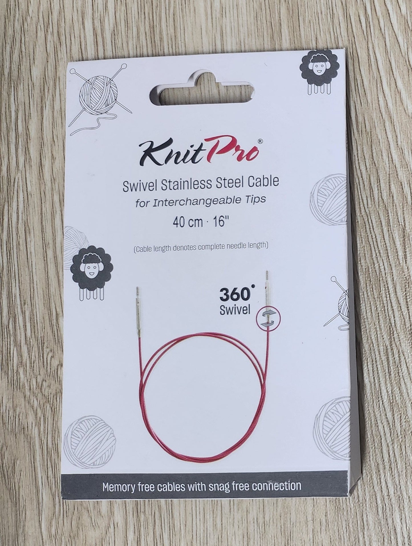 Knut Pro cable packaging on a wooden surface