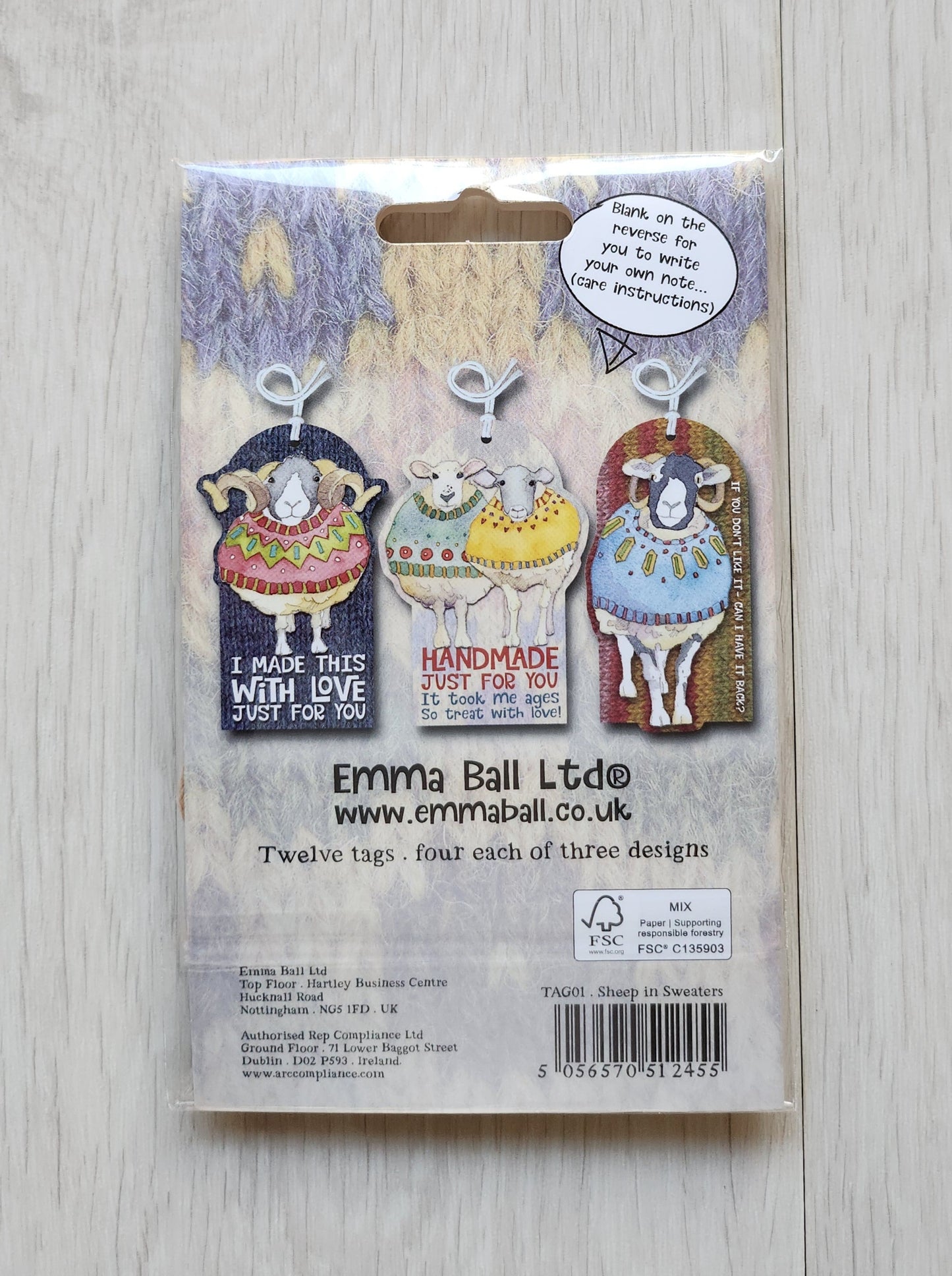Packaging of 'Crafting Tags' with a decorative owl design on a light wooden surface.  Emma ball