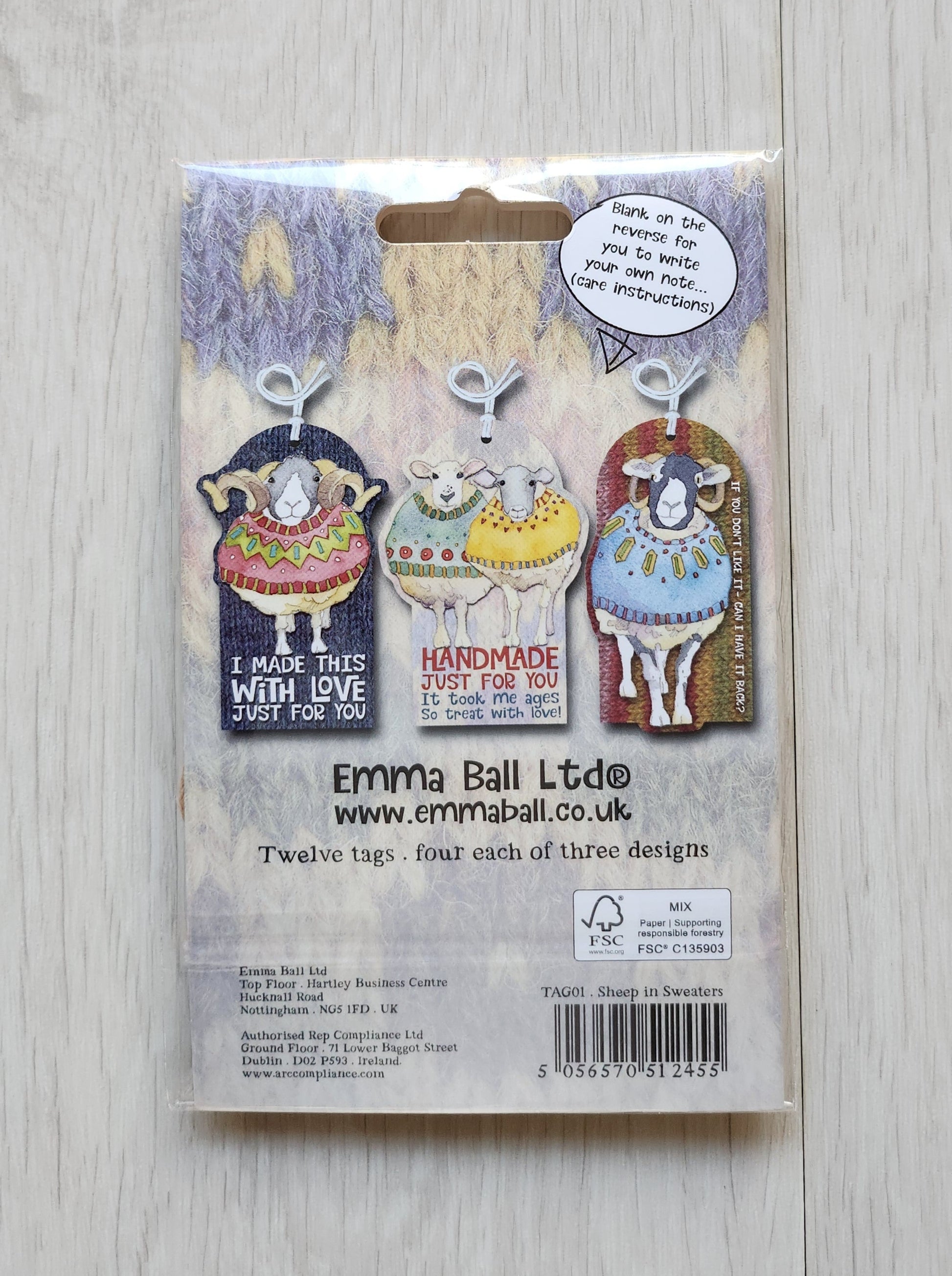 Packaging of 'Crafting Tags' with a decorative owl design on a light wooden surface.  Emma ball