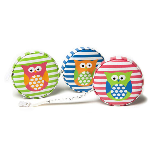 Three colorful retractable tape measures with owl designs on a white background