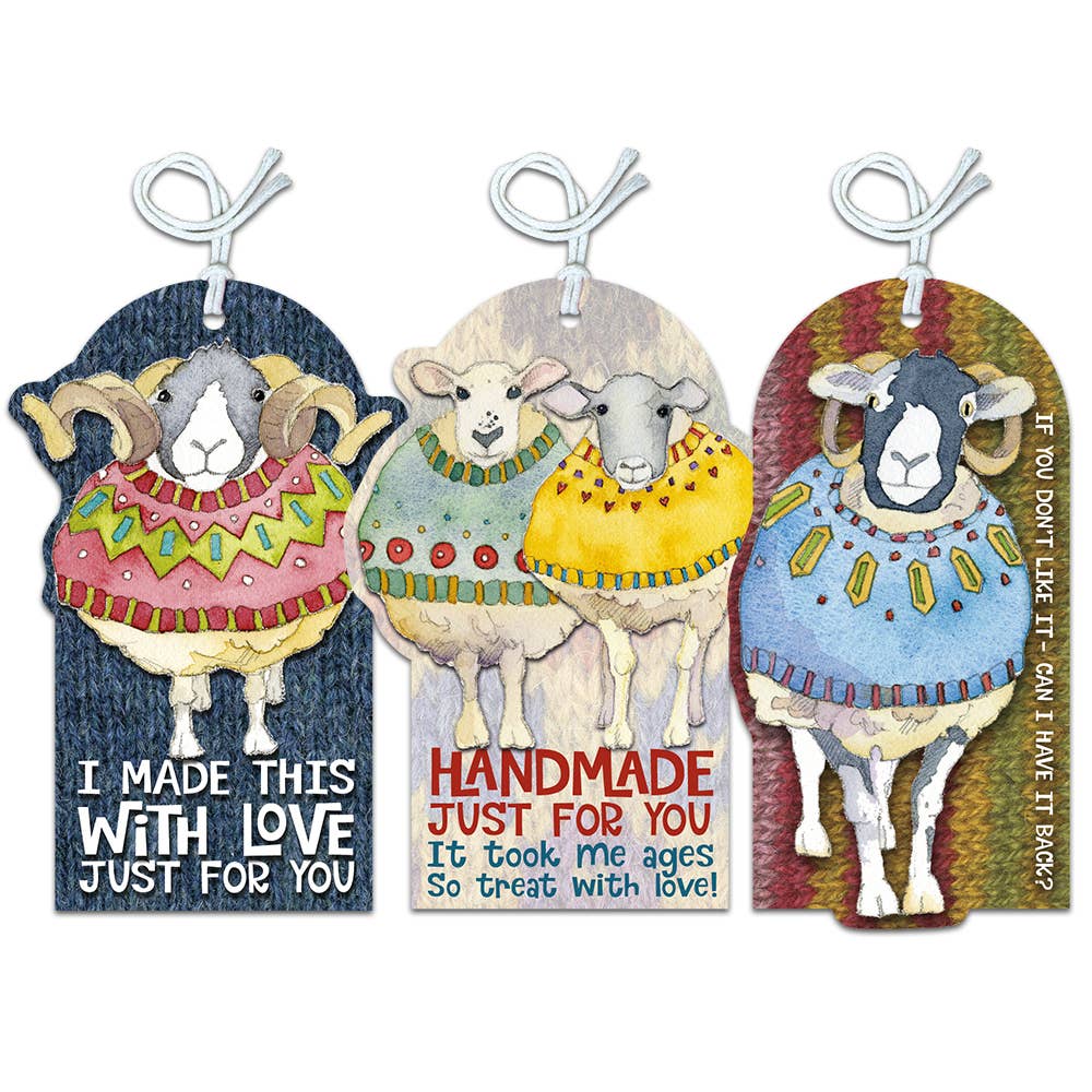 Three sheep-themed gift tags with colorful sweaters and text on a white background