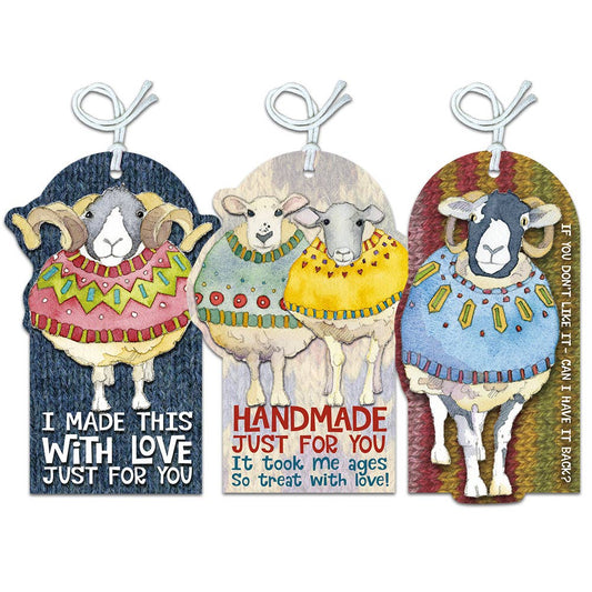 Three sheep-themed gift tags with colorful sweaters and text on a white background