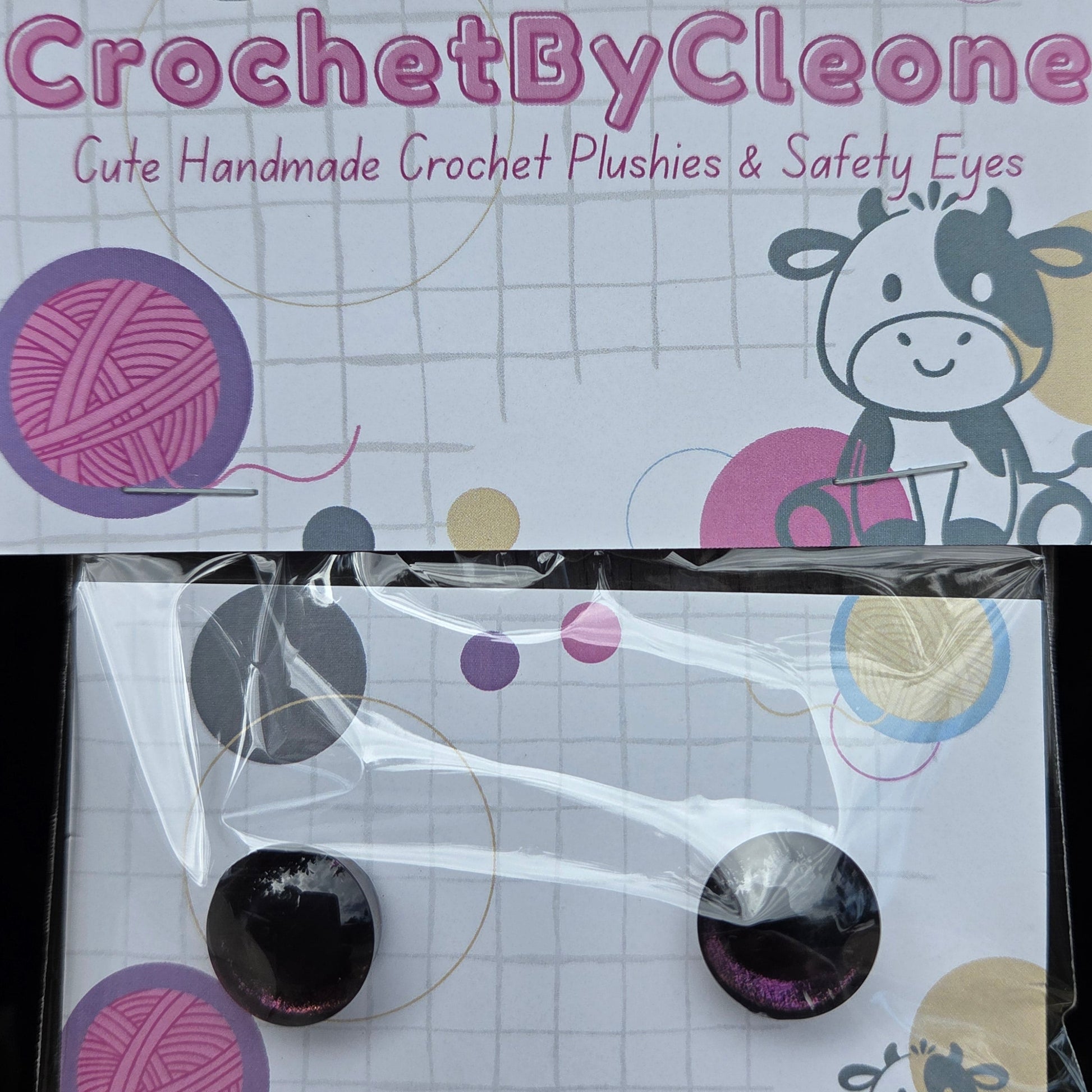 Two packaged crochet safety eyes displayed on branded cards. The left card shows the product packaging with the text 'CrochetByCleone' and 'Gute Handmade Crochet Plushies & Safety Eyes,' along with a cow illustration and yarn ball graphics.